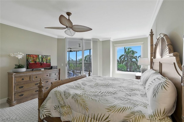 bedroom featuring ornamental molding, access to outside, carpet flooring, and multiple windows