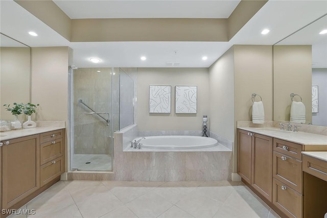 bathroom featuring a garden tub, recessed lighting, vanity, tile patterned floors, and a stall shower