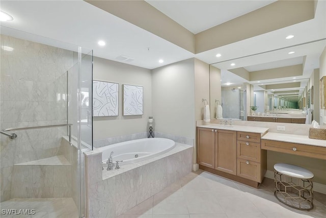 bathroom featuring a garden tub, recessed lighting, vanity, a shower stall, and tile patterned floors