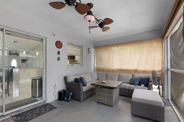 view of patio / terrace with a ceiling fan and an outdoor hangout area