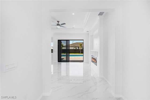 interior space with marble finish floor, recessed lighting, visible vents, ornamental molding, and baseboards