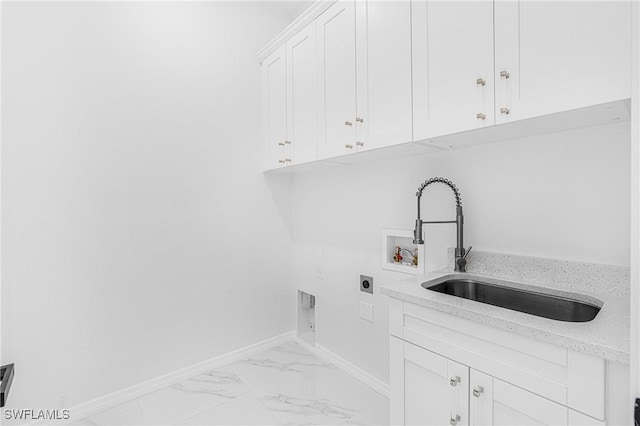 laundry area featuring hookup for a washing machine, baseboards, marble finish floor, cabinet space, and electric dryer hookup