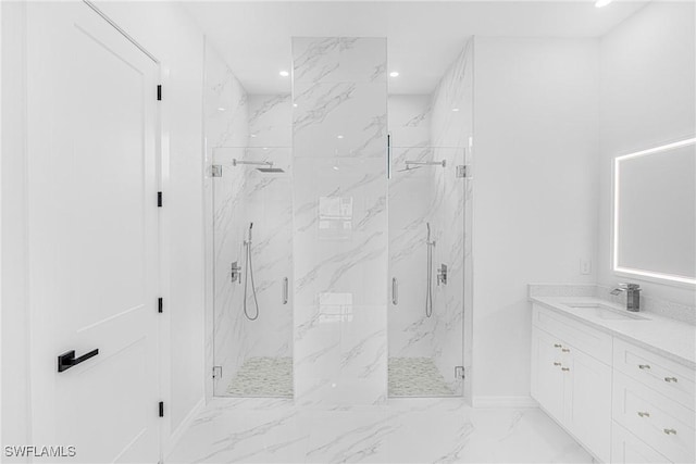 full bathroom featuring marble finish floor, a marble finish shower, vanity, and recessed lighting