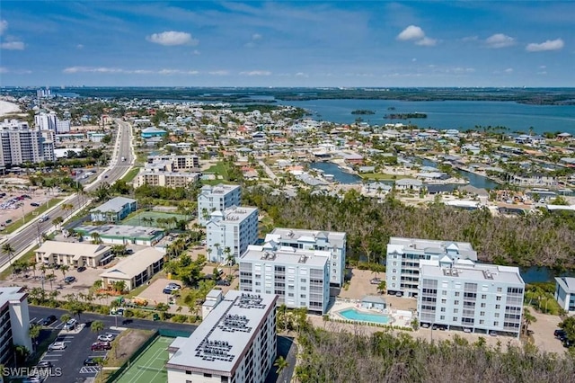 drone / aerial view with a view of city and a water view