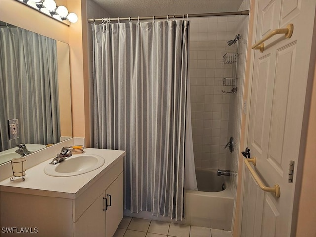 bathroom with shower / bath combo with shower curtain, vanity, and tile patterned floors