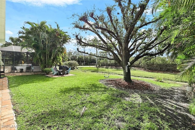 view of yard featuring a lanai