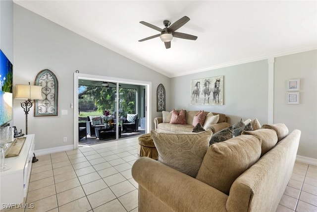 living room featuring ornamental molding, light tile patterned flooring, vaulted ceiling, ceiling fan, and baseboards