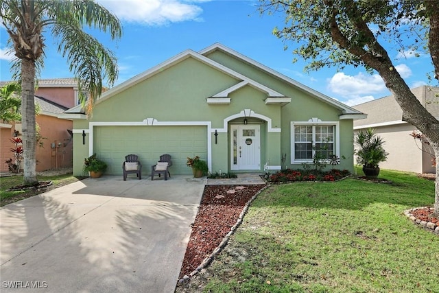 single story home featuring a garage, a front yard, driveway, and stucco siding