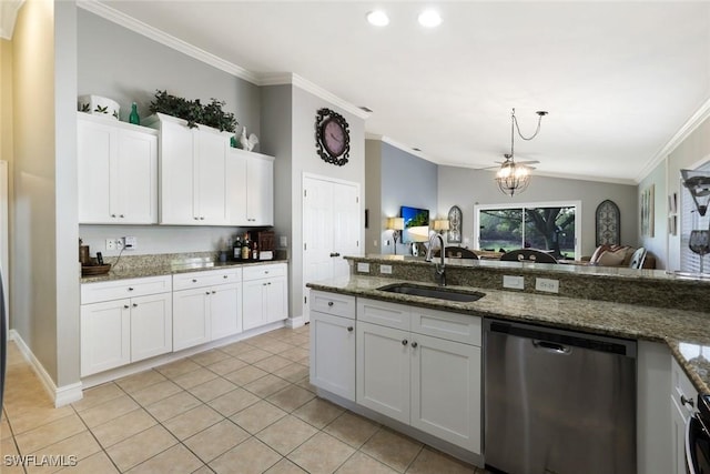 kitchen featuring white cabinets, ornamental molding, vaulted ceiling, stainless steel dishwasher, and a sink