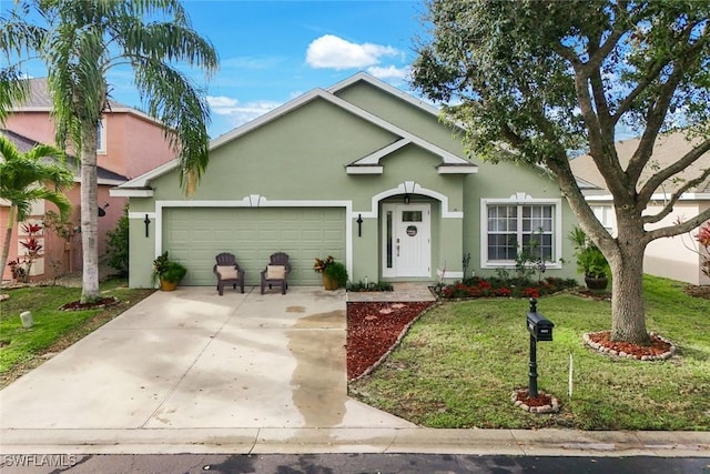 ranch-style home with a garage, driveway, a front lawn, and stucco siding