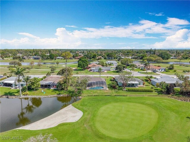4364 Beechwood Lake Dr, Naples, FL 34112 - drone / aerial view featuring view of golf course, a water view, and a residential view