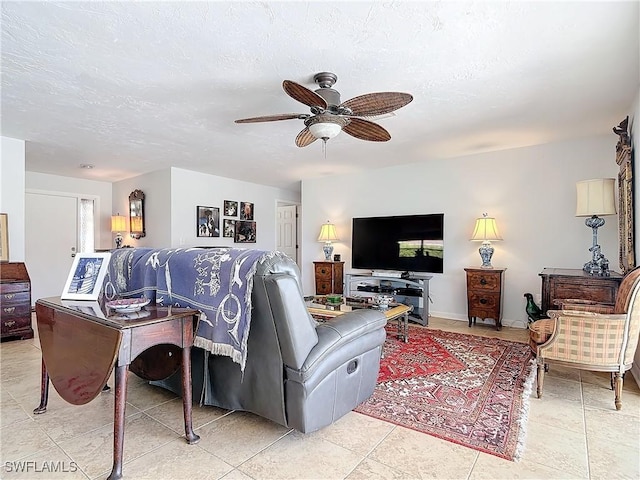 4364 Beechwood Lake Dr, Naples, FL 34112 - living area with a ceiling fan, a textured ceiling, and light tile patterned floors