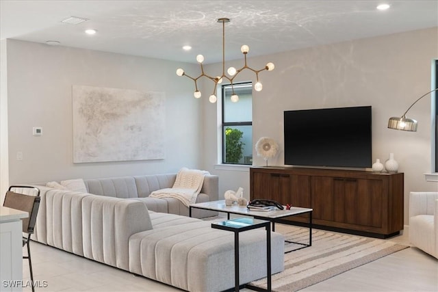 living room featuring recessed lighting, visible vents, and light wood finished floors