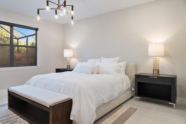 bedroom featuring baseboards