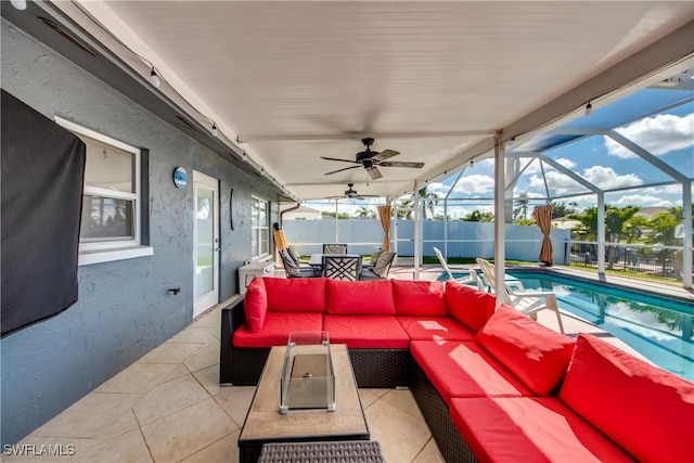 view of patio featuring a fenced backyard, a fenced in pool, outdoor lounge area, and a ceiling fan