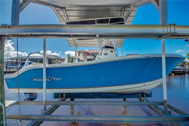 view of dock with boat lift