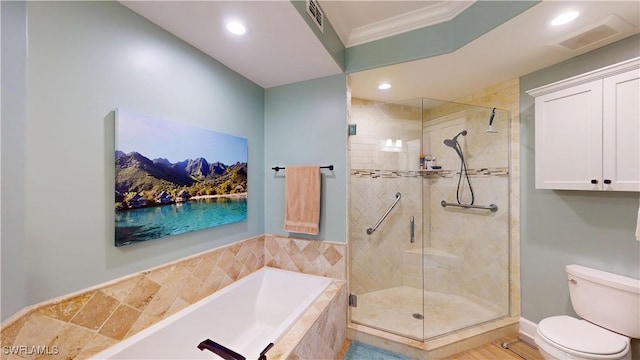 bathroom featuring visible vents, toilet, ornamental molding, a stall shower, and a bath