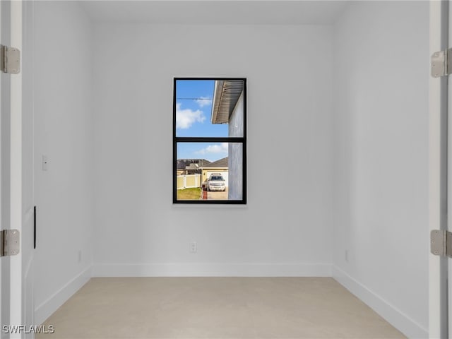 1612 NW 9th Ave, Cape Coral, FL 33993 - unfurnished room featuring baseboards