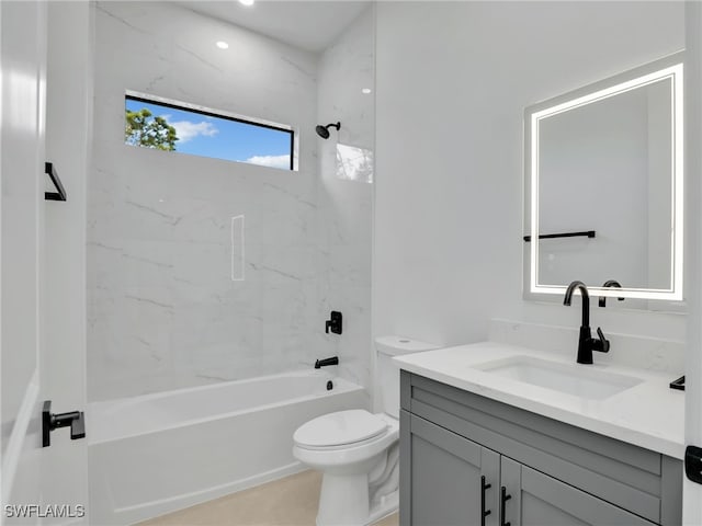 full bathroom featuring shower / tub combination, vanity, and toilet