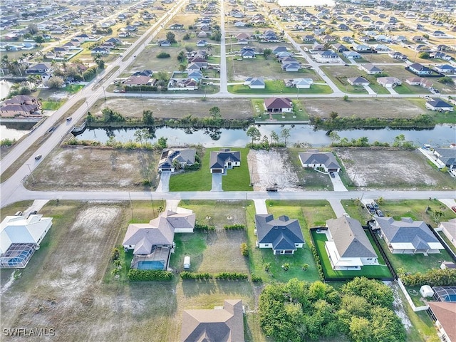 1612 NW 9th Ave, Cape Coral, FL 33993 - aerial view with a residential view and a water view