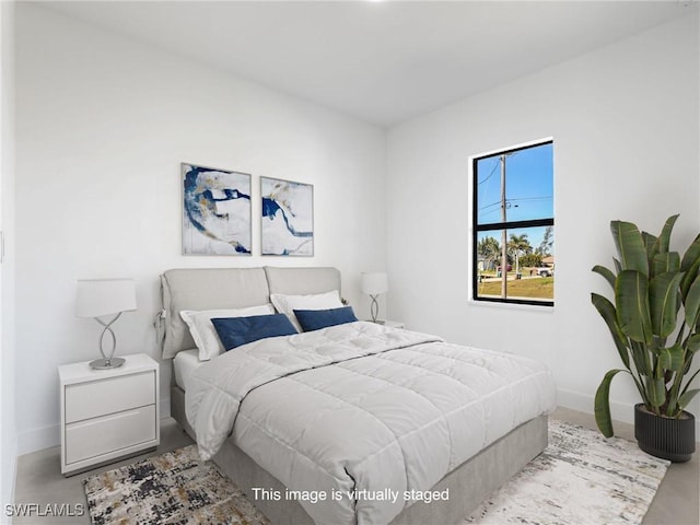 1612 NW 9th Ave, Cape Coral, FL 33993 - bedroom featuring baseboards