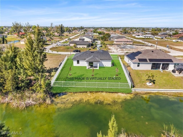 1612 NW 9th Ave, Cape Coral, FL 33993 - drone / aerial view featuring a residential view and a water view
