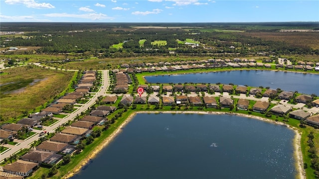 aerial view featuring a water view and a residential view