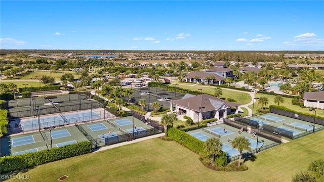 birds eye view of property with a residential view