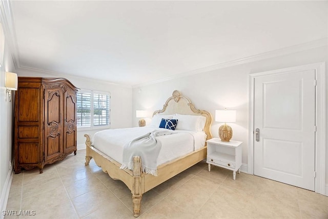 bedroom featuring light tile patterned flooring, crown molding, and baseboards