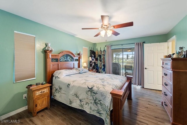 bedroom with access to outside, wood finished floors, a ceiling fan, and baseboards