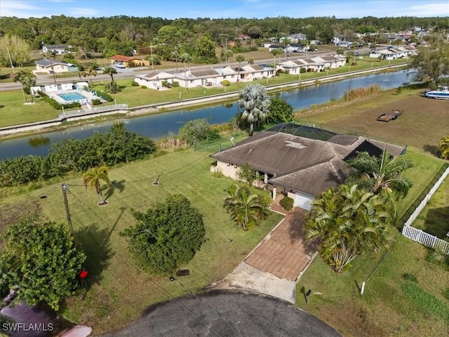 aerial view with a water view and a residential view