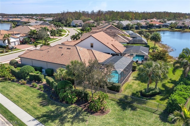 bird's eye view with a residential view and a water view