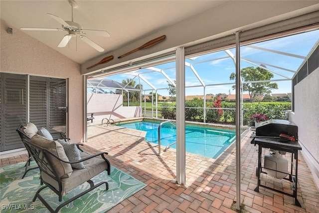 11596 Quail Village Way, Naples, FL 34119 - swimming pool featuring ceiling fan, a patio area, and glass enclosure