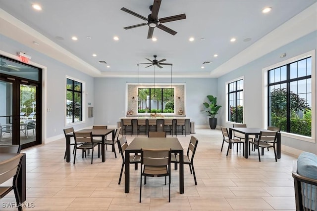 dining space with baseboards, visible vents, and recessed lighting