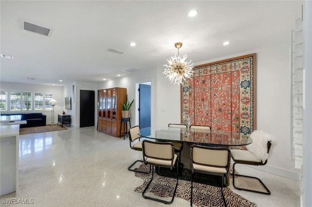 dining area featuring speckled floor, visible vents, recessed lighting, and a chandelier