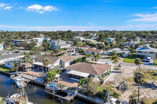 aerial view featuring a residential view and a water view