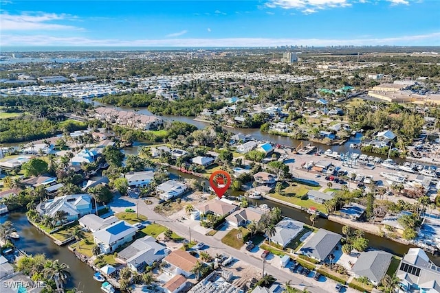 aerial view featuring a residential view and a water view