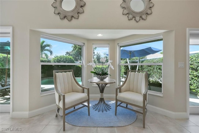 sunroom / solarium with a wealth of natural light