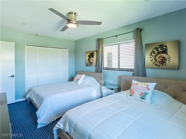 bedroom featuring carpet floors, a closet, and a ceiling fan