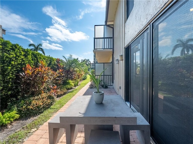 view of patio / terrace featuring a balcony