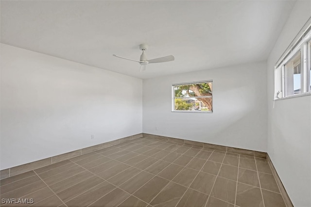 2501 Rio Grande Dr, Punta Gorda, FL 33950 - unfurnished room featuring tile patterned floors and a ceiling fan