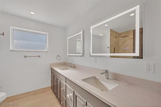 2501 Rio Grande Dr, Punta Gorda, FL 33950 - bathroom with a sink, toilet, walk in shower, and double vanity