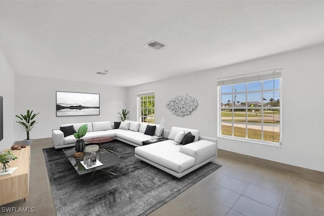 2501 Rio Grande Dr, Punta Gorda, FL 33950 - living area featuring tile patterned flooring, visible vents, and baseboards