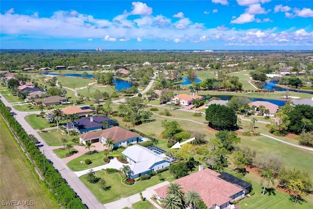 birds eye view of property featuring a residential view and a water view