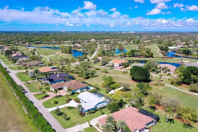 birds eye view of property with a residential view and a water view