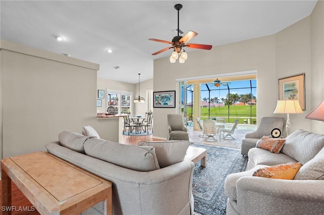 living room featuring recessed lighting and ceiling fan