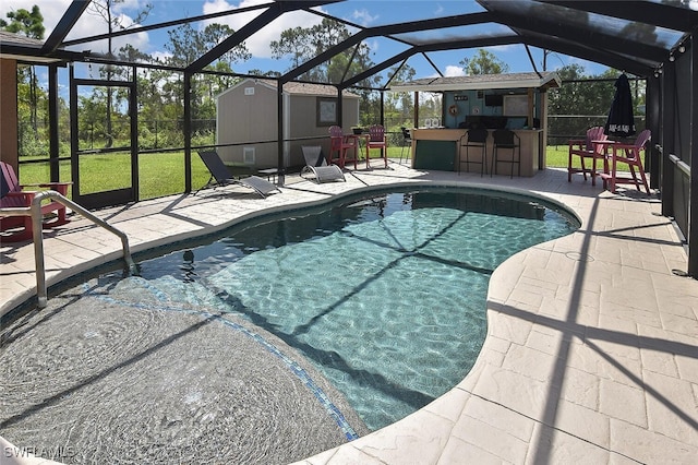 outdoor pool featuring outdoor dry bar, a patio, and a lanai