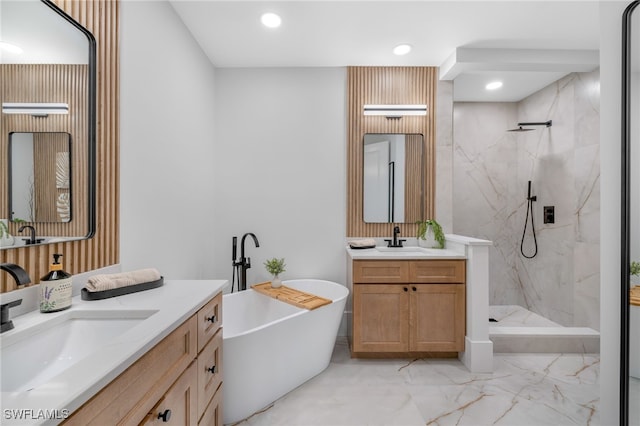 bathroom with marble finish floor, a marble finish shower, and a sink