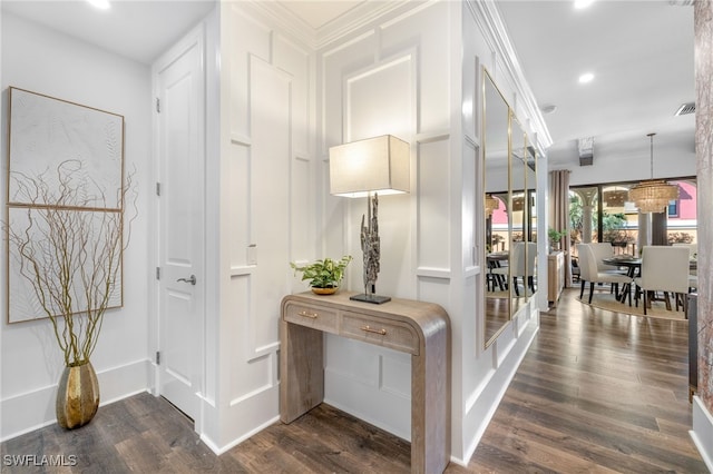 corridor with baseboards, visible vents, dark wood-style flooring, and recessed lighting