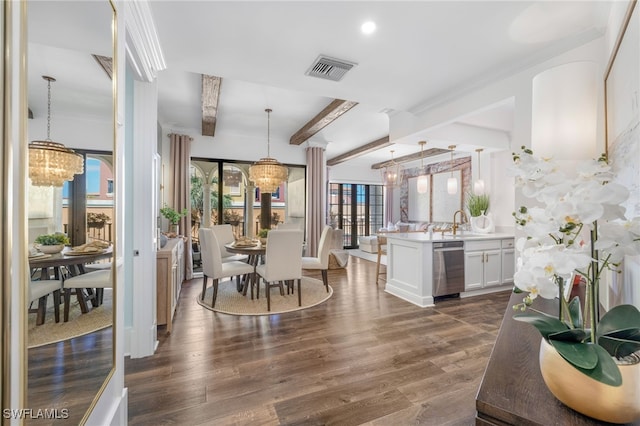 dining room featuring dark wood-style floors, beam ceiling, visible vents, and a notable chandelier